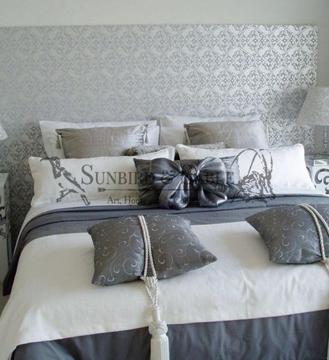 Cole & Son wallpapered light grey flocked decorative panel or headboard