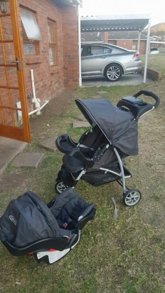 Graco pram with a car seat and baby rear view mirror