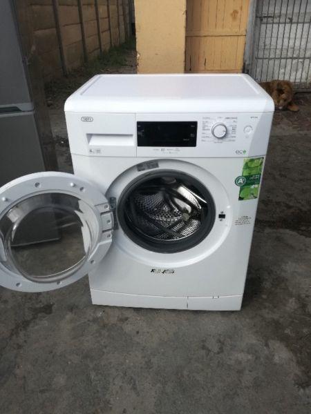 Defy front loader washing machine as good as new R2500