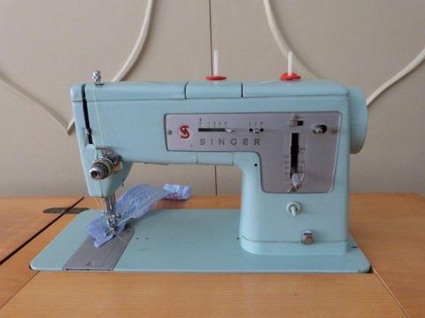 Singer electric sewing machine and cabinet