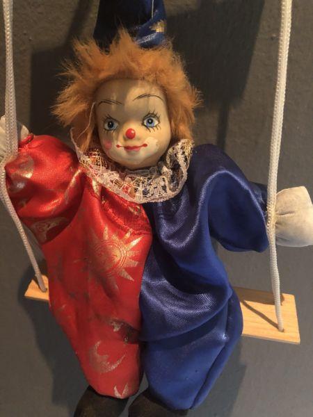 Porcelain clown doll