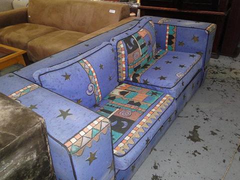 Nice colorful 2 Seater Couch - R1500