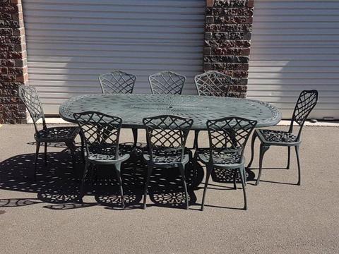 Cast Aluminium 8 seater Patio set table and 8 excellent condition chairs