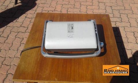 Fat grilling machine