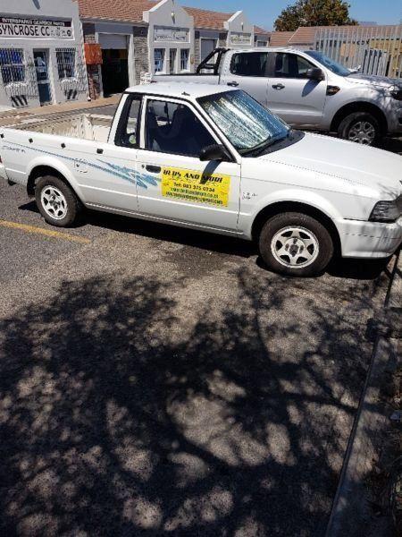 Bakkie with driver and assistant, for deliveries, transport and removals