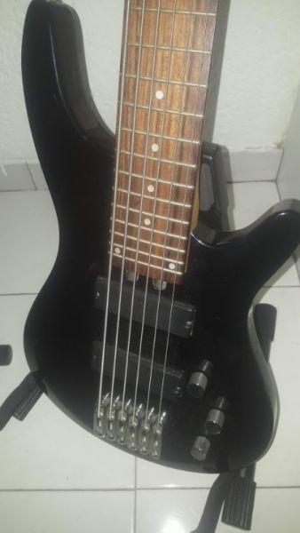 Six-string bass guitar and Behringer V-Amp effects unit