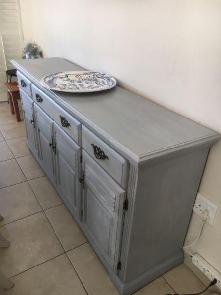Grey blue sideboard and white 6-drawer dressing table