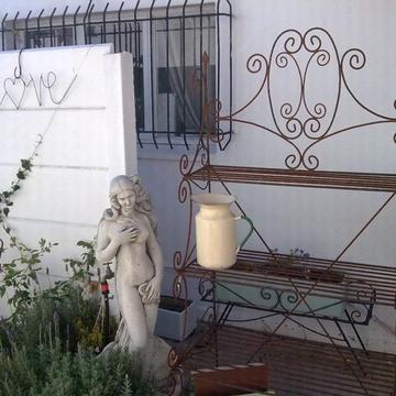 Wrought iron garden potstand