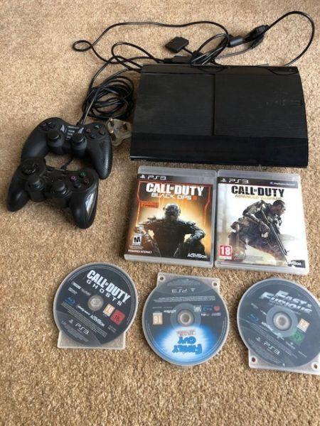 Ps3 for sale, with 2 controllers, and 5 games