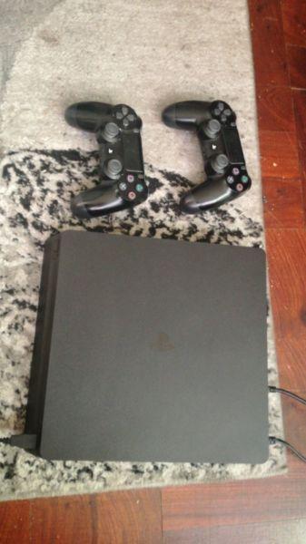 1tb PS4 bundle with FIFA and 2 controls