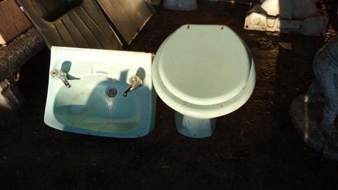 Bath, toilet pot and basin. Light blue