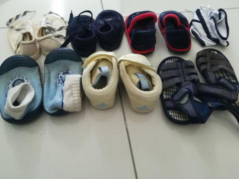 Seven pairs of assorted baby shoes