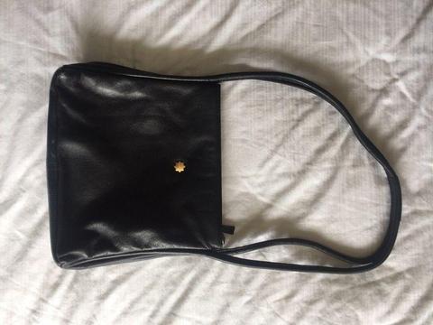 black leather hand bag