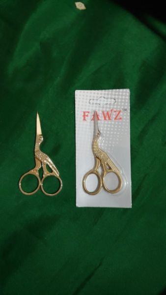 Popular little Stork needle work scissors for sale. Te koop