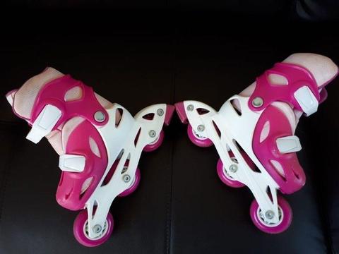 GIRLS PINK IN LINE ROLLER SKATES FOR SALE (by Avigo) - in great condition