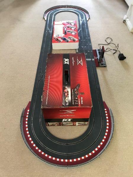 SCX - the digital system - 1:32 scale racing system - slot cars