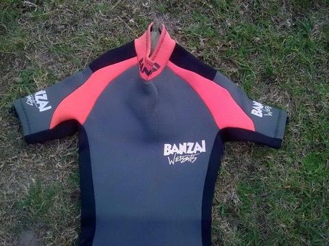 Wetsuit: Banzai size BM (Boys Medium) grey with black and orange trim