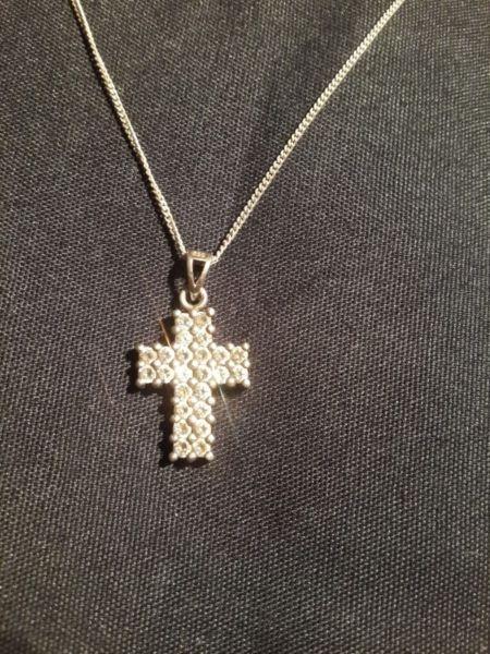Silver Cross Pendant on Silver Necklace