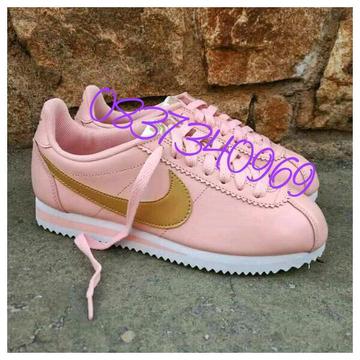 Pink nike cortez available