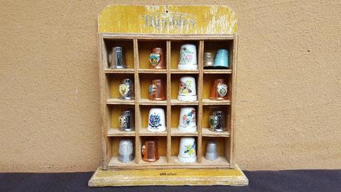 Lovely old little display of thimbles