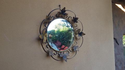Lovely old metal leaf mirror