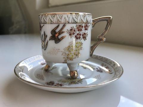 Antique China tea cup with saucer