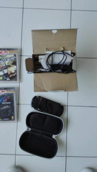 Psp for sale(like new). Including 6 games