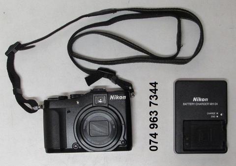 Nikon COOLPIX P7000 (SLR) Bridge Digital Camera 7x Optical with Charger