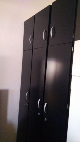 Bran new 3 Door Cupboard (black) with shelves on one side and hanging space plus top extention