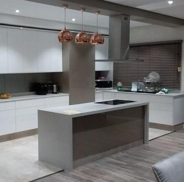 Granite tops quartz tops and modern design kitchen built ins , bedroom units and bathroom vanities