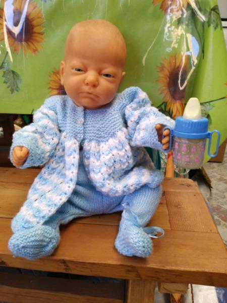 Collectible old boy doll