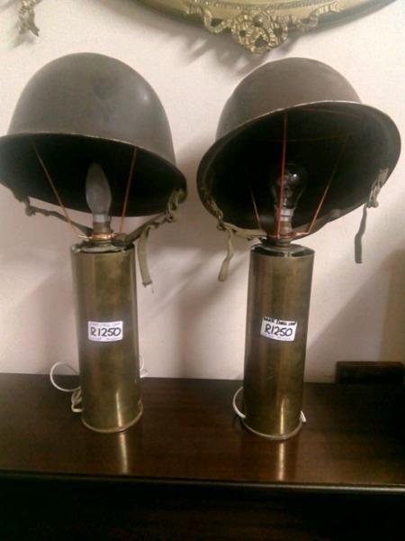 Pair of lamps brass cannon shells and army helmets