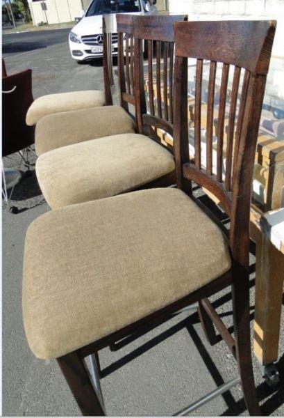 Solid Dark-wood Bar chairs in excellent condition - R 650 each negotiable