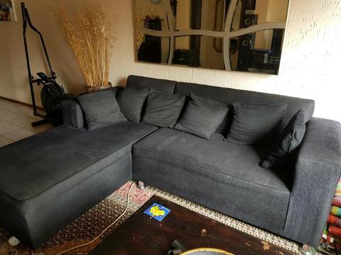 L shaped black couch for sale