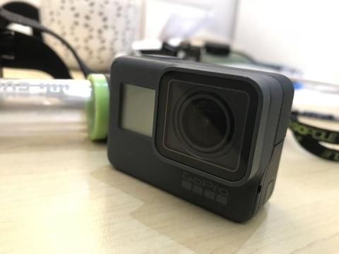 Gopro hero 5 black with head strap and mountain stick