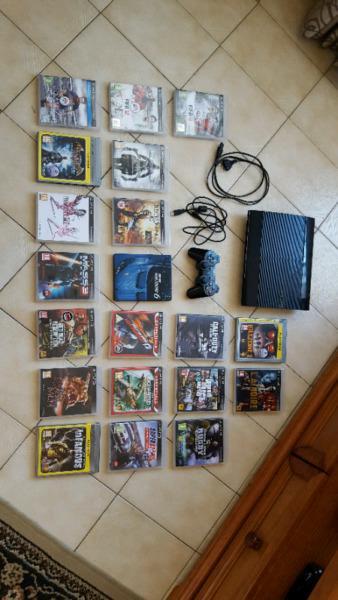 Play Station 3 slim 500gigs in great condition and comes with 20 games
