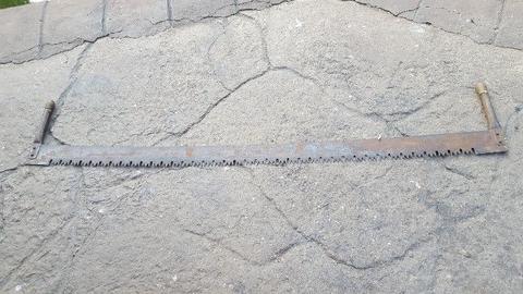 Large old crosscut saw