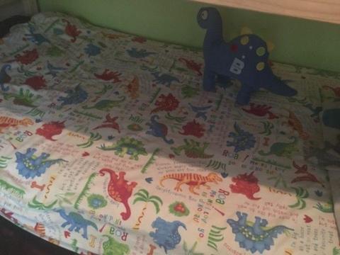 Dinosaur duvet, bunting and wall art