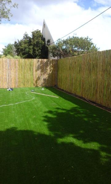 Wood and bamboo fencing and ceiling and pargola