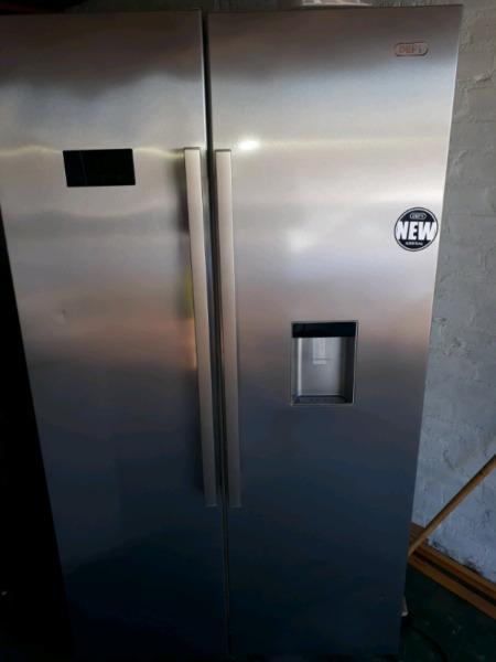 Defy stainless steel side by side fridge freezer with water dispensor