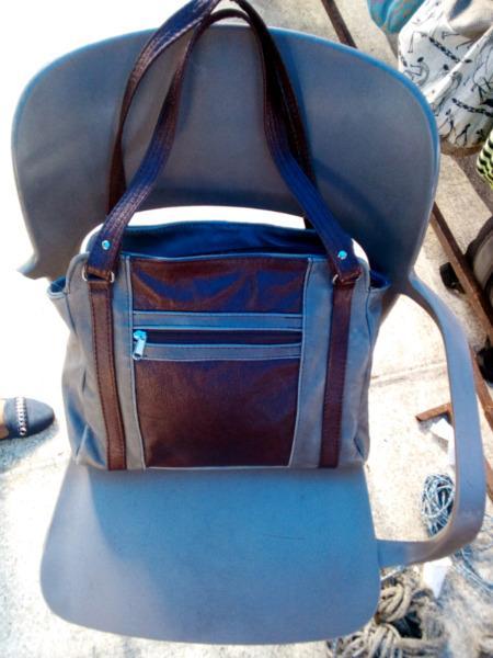 Leather handbags , backpacks and sling backs