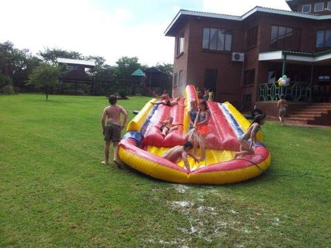 Double lane inflatable water-slide