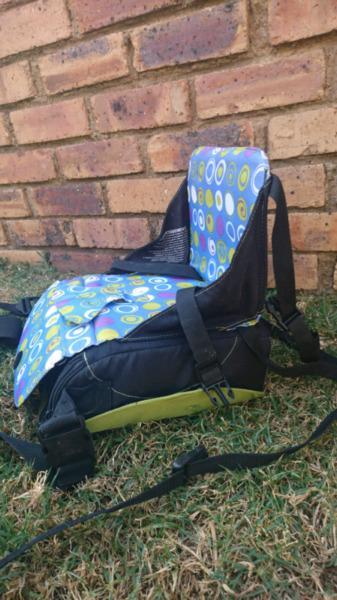 Munchkin travel booster seat