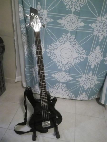 Washburn bass guitar with accessories