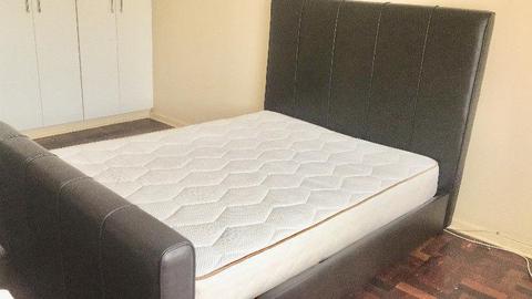 Leather Queen size bed with mattress brand Coricraft