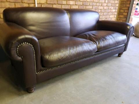 Full leather studded couch in excellent condition R 7900