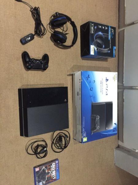 Playstation 4 with gaming headset and one game