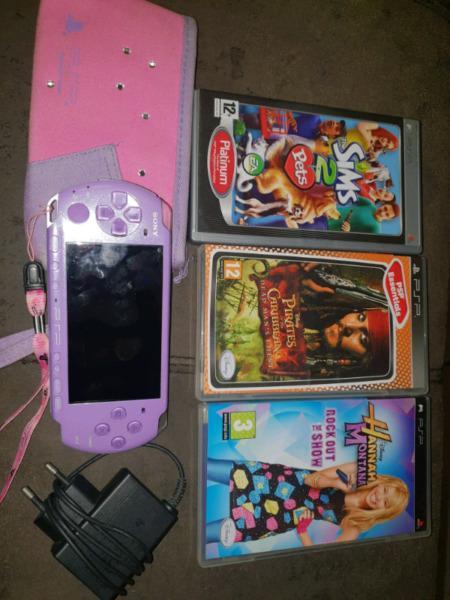PINK SONY PSP with 3 games, charger branded bag