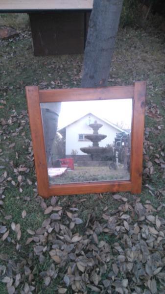 Mirror in wood frame