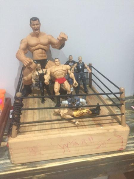 Wrestling ring with 7 wrestlers